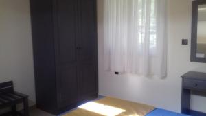 Postel nebo postele na pokoji v ubytování Mathesi Apartment Sea View