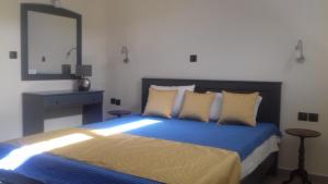 Postel nebo postele na pokoji v ubytování Mathesi Apartment Sea View