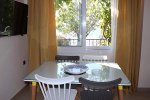 TV a/nebo společenská místnost v ubytování Mathesi Apartment Sea View