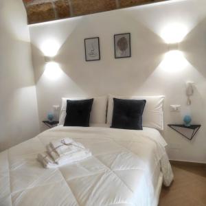 Postel nebo postele na pokoji v ubytování Agorà Home