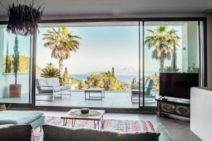 a living room with a view of the ocean at CASA DOS MARES in Tarifa