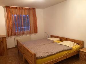 Ein Bett oder Betten in einem Zimmer der Unterkunft Résidences du Chamossaire