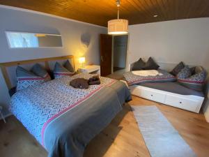 เตียงในห้องที่ Casa Restelli OG - nahe Andermatt Gotthard