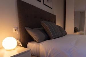 Postel nebo postele na pokoji v ubytování Apartamento Albelda Centro