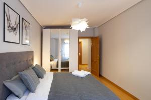Postel nebo postele na pokoji v ubytování Apartamento Albelda Centro