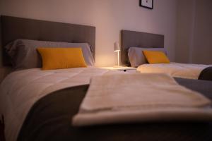 Postel nebo postele na pokoji v ubytování Apartamento Albelda Centro