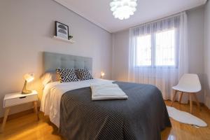 Postel nebo postele na pokoji v ubytování Apartamento Albelda Centro
