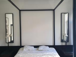 Postel nebo postele na pokoji v ubytování B96 suites + 20 fotografií