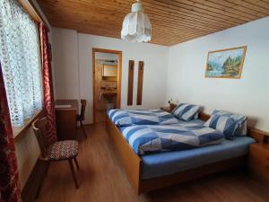 Postel nebo postele na pokoji v ubytování Plaun Grond
