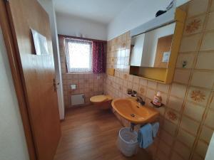 Koupelna v ubytování Plaun Grond