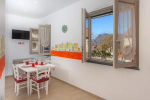 Et tv og/eller underholdning på Casa Vacanze La Via delle Stelle