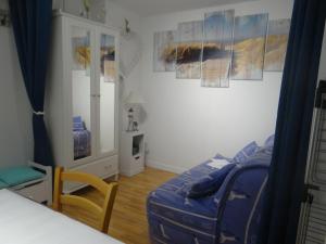 Postel nebo postele na pokoji v ubytování Appartement Ste Cécile à 50 mètres de la plage