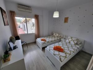 Fotografia z galérie ubytovania Apartamento Con Encanto "Larios Street" v destinácii Málaga