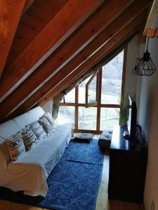Postel nebo postele na pokoji v ubytování Dúplex con terraza y vistas panorámicas en Taüll + 37 fotografií