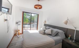 מיטה או מיטות בחדר ב-Marrakech Villa Serrana