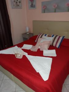 A bed or beds in a room at AFFITTACAMERE Il Cortile