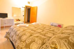 A bed or beds in a room at Bed and Breakfast La Sosta