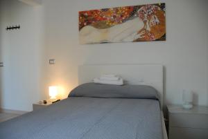 Messina41 Hotel客房内的一张或多张床位