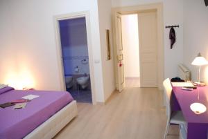 Messina41 Hotel客房内的一张或多张床位