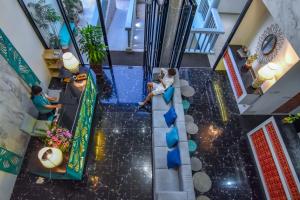 an overhead view of a wedding ceremony in a building at Norn Talay Surin Beach Phuket in Surin Beach +37 photos