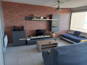 Μια τηλεόραση ή/και κέντρο ψυχαγωγίας στο Appartement vue mer