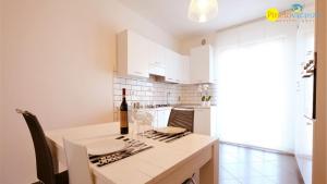 Η κουζίνα ή μικρή κουζίνα στο Mango 2 Pineto Vacanza