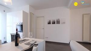 Η κουζίνα ή μικρή κουζίνα στο Mango 2 Pineto Vacanza +5 φωτογραφίες