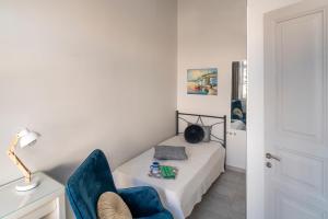 Postel nebo postele na pokoji v ubytování Beautiful Neoclassical House in Rhodes town
