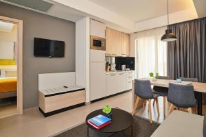 A kitchen or kitchenette at CIS01087 Apartments Park Plava Laguna, Porec-A4TP2, 4EG, ca 41 qm, 6 pax
