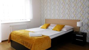 Łóżko lub łóżka w pokoju w obiekcie Family Homes - Dom Wakacyjny EDA