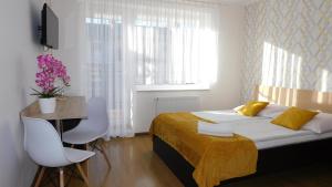 Łóżko lub łóżka w pokoju w obiekcie Family Homes - Dom Wakacyjny EDA