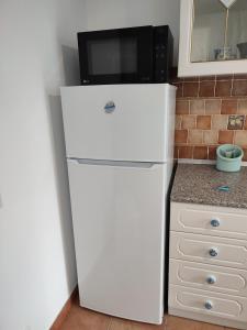 A kitchen or kitchenette at MOLO 78 Case Vacanze