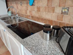 A kitchen or kitchenette at MOLO 78 Case Vacanze