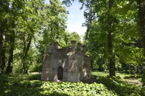 an old castle in the middle of a forest at Le Notti in Villa in Fontanellato
