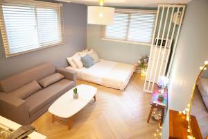 Posezení v ubytování Hostel Mihojae Seomyeon
