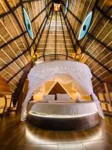 Voodi või voodid majutusasutuse Igabara Hobbit House toas