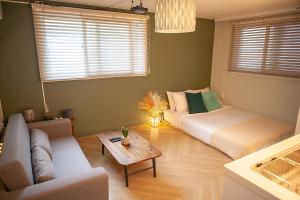 Posezení v ubytování Hostel Mihojae Seomyeon