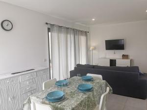 Μια τηλεόραση ή/και κέντρο ψυχαγωγίας στο Villaverde Relax 2 a 10 minutos de Corralejo