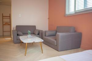 Posezení v ubytování Hostel Mihojae Seomyeon