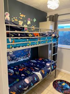 a bunk bed room with two bunk beds at Apartment 18 Hill View in Brean