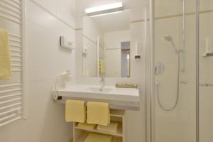 Kúpeľňa v ubytovaní Hotel Mesnerwirt