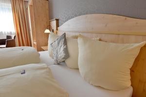 Posteľ alebo postele v izbe v ubytovaní Hotel Mesnerwirt