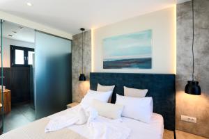 Posteľ alebo postele v izbe v ubytovaní SAMI BEACHVIEW