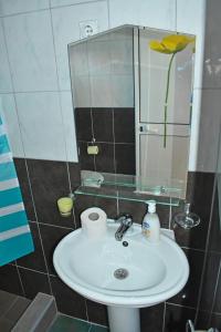 A bathroom at Riverside Apartments Chiara