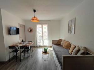 Zona d'estar a Casa Flamingo - Appartement calme et moderne - 4 -