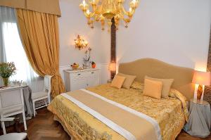 Postel nebo postele na pokoji v ubytování B&B Villa Ines