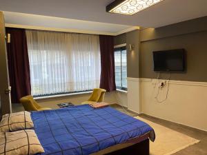 Tempat tidur dalam kamar di Setpark Apart Otel