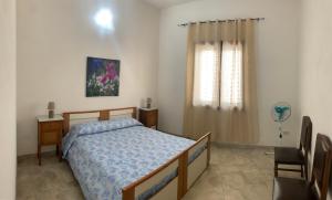 Postel nebo postele na pokoji v ubytování Casa Vacanze Mandriavecchia