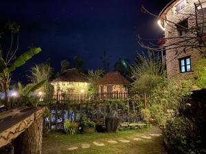 Vrt pred nastanitvijo Bhanjyang Village Lodge