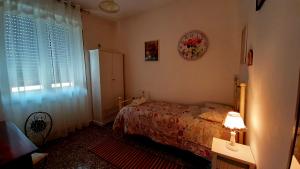 Postel nebo postele na pokoji v ubytování B&B Rosa